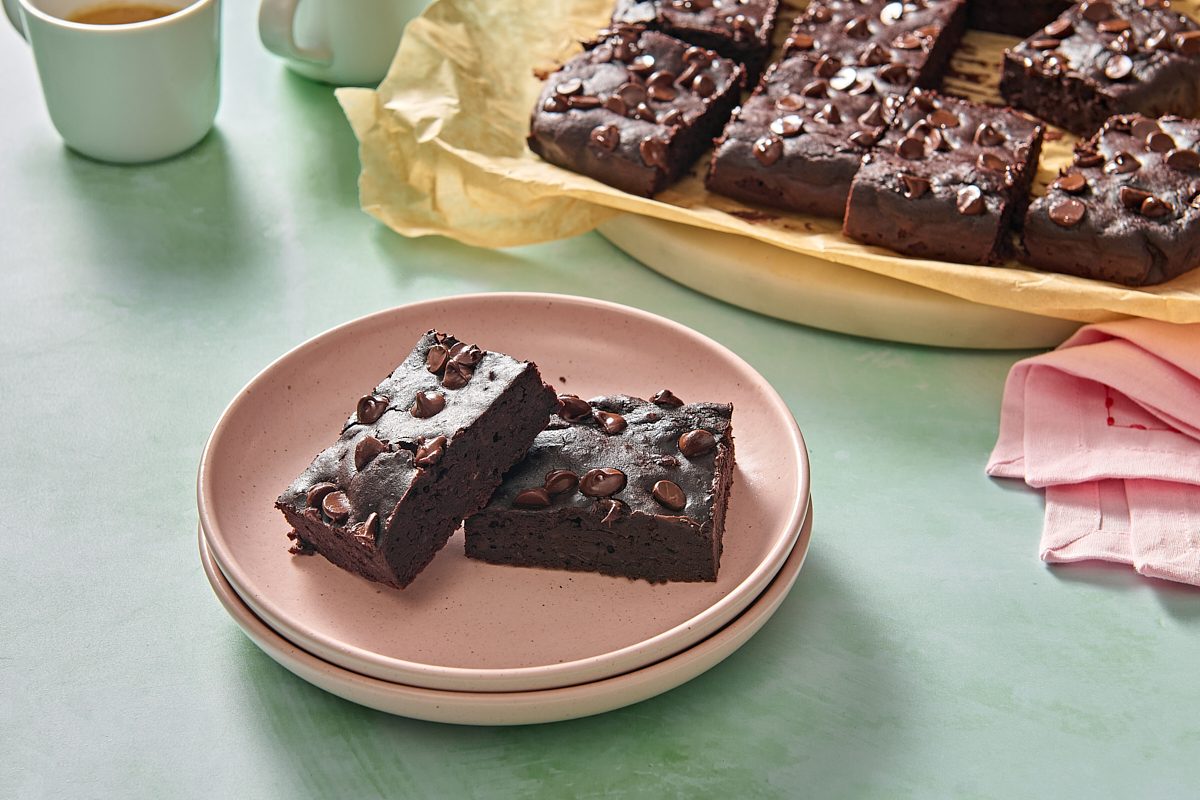 Closeup of two black bean brownies on a plate