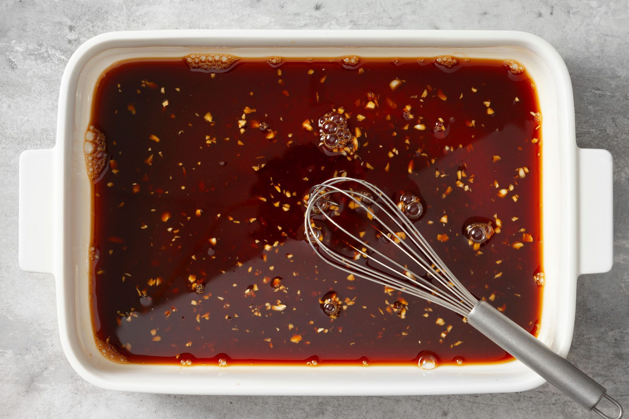 In a large dish or shallow bowl, combine the soy sauce, lemon juice, honey and garlic