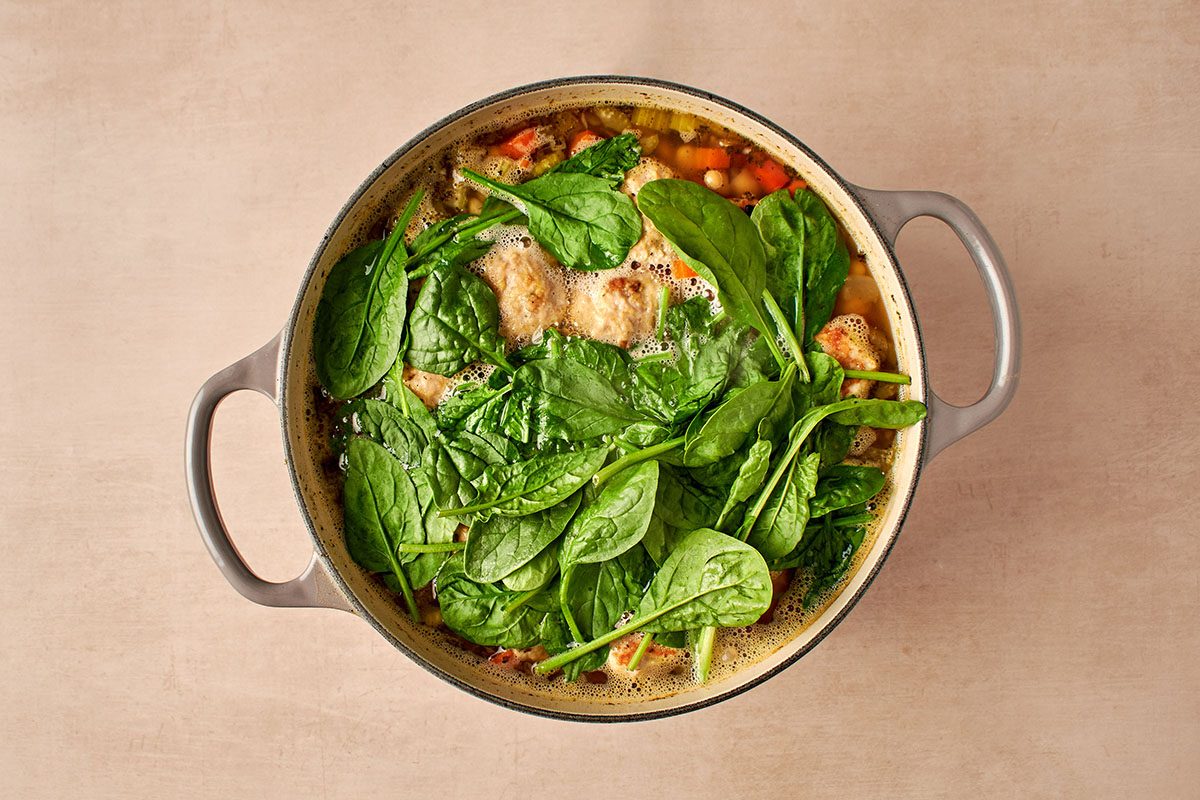 Add spinach and meatballs