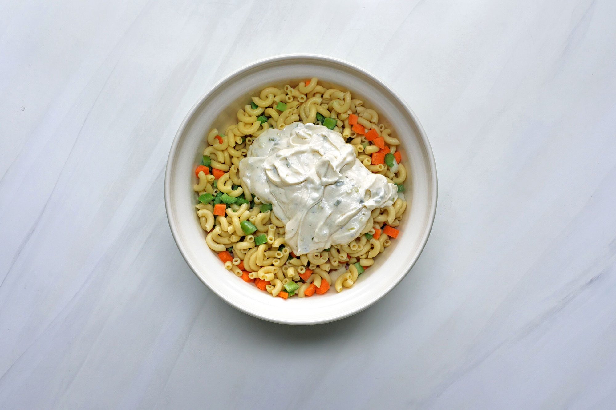 Added dressing into the bowl