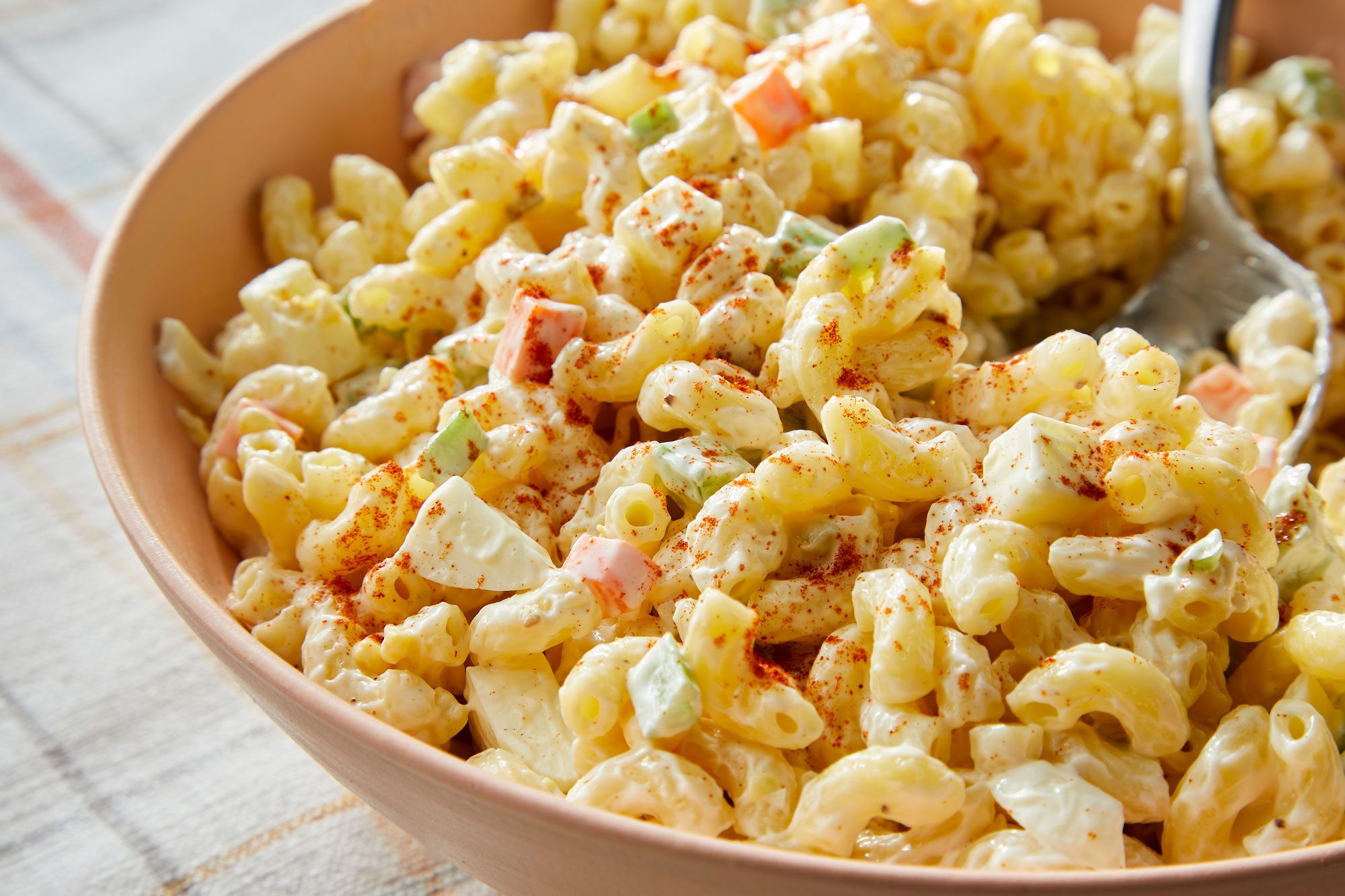 Macaroni Salad Recipe served in a bowl with fork