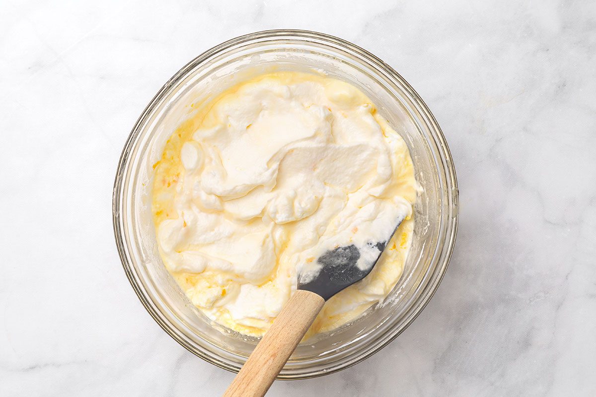 Whipped heavy cream mixed with milk mixture for Step 2 of Orange Ice Cream for Taste of Home