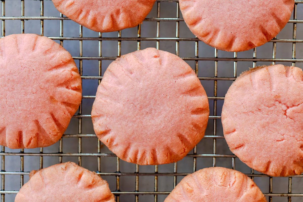 Pretty pink, jelly filled, strawberry sandwich cookies with step-by-step instructions from Taste of Home.