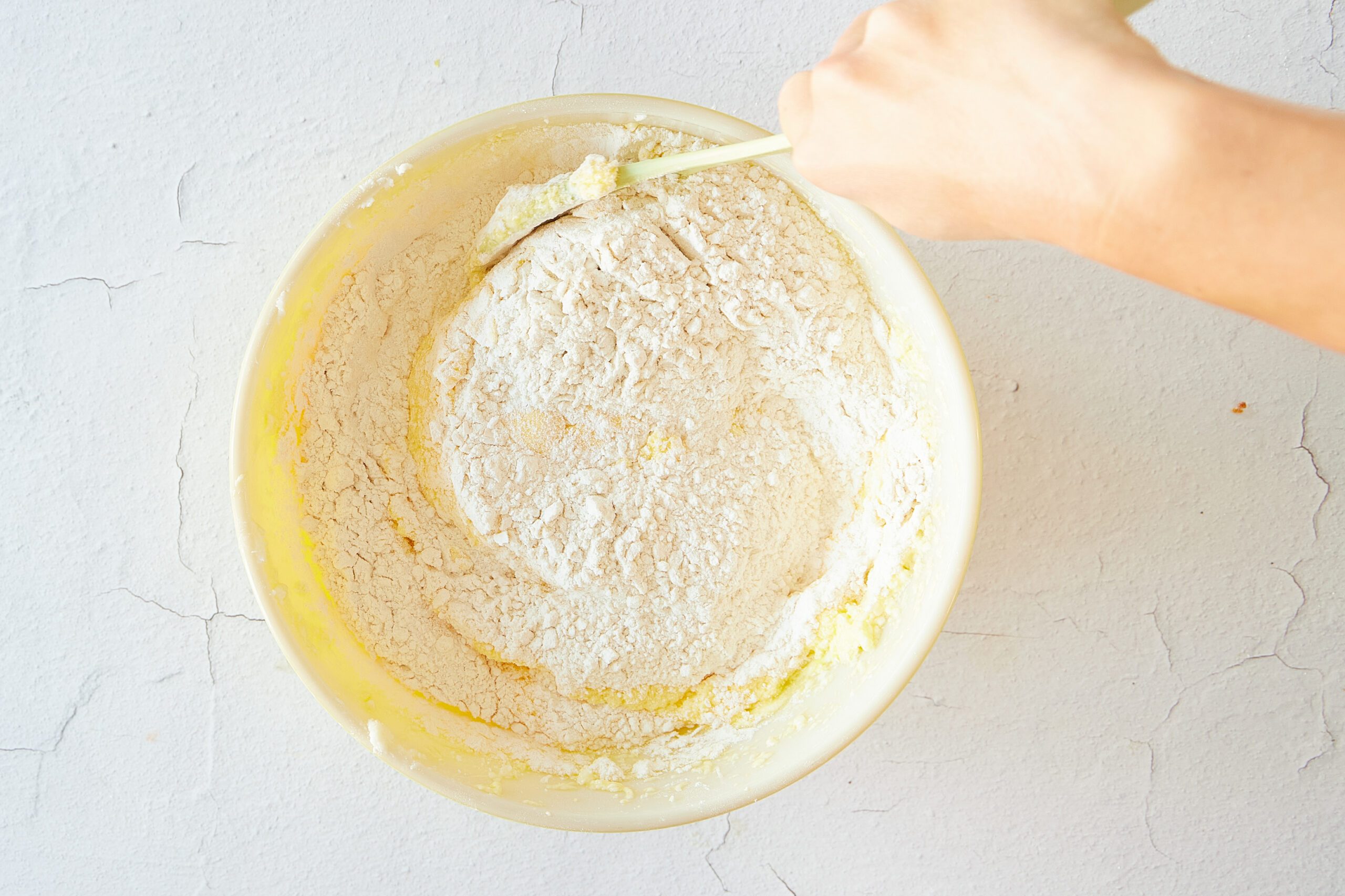 Add the dry ingredients for almond pound cake.