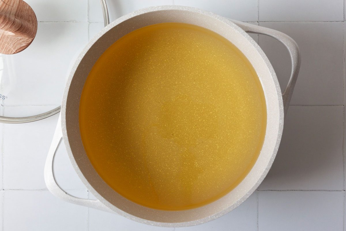 Step 1 of Taste of Home Pancakes and Sausage on a Stick is to heat the oil to 375°F.