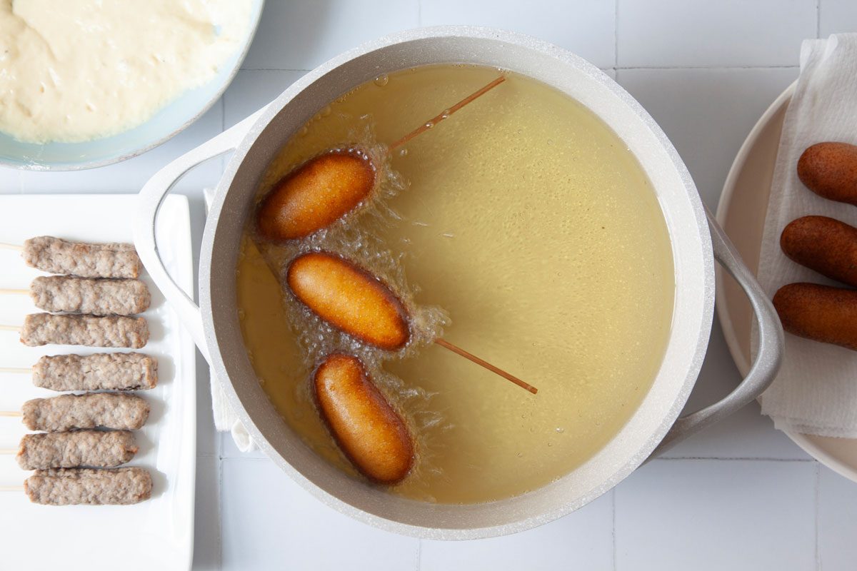 Step 3 of Taste of Home Pancakes and Sausage on a Stick is to Insert skewers into sausage links and pat them dry with paper towels. Work with a few sausages at a time. Dip each sausage link into the batter and fry until golden brown, about two to three minutes, turning occasionally. Drain on paper towels and serve with maple syrup.