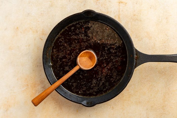 Taste of Home Red Eye Gravy recipe photo of the coffee added to the pan drippings.