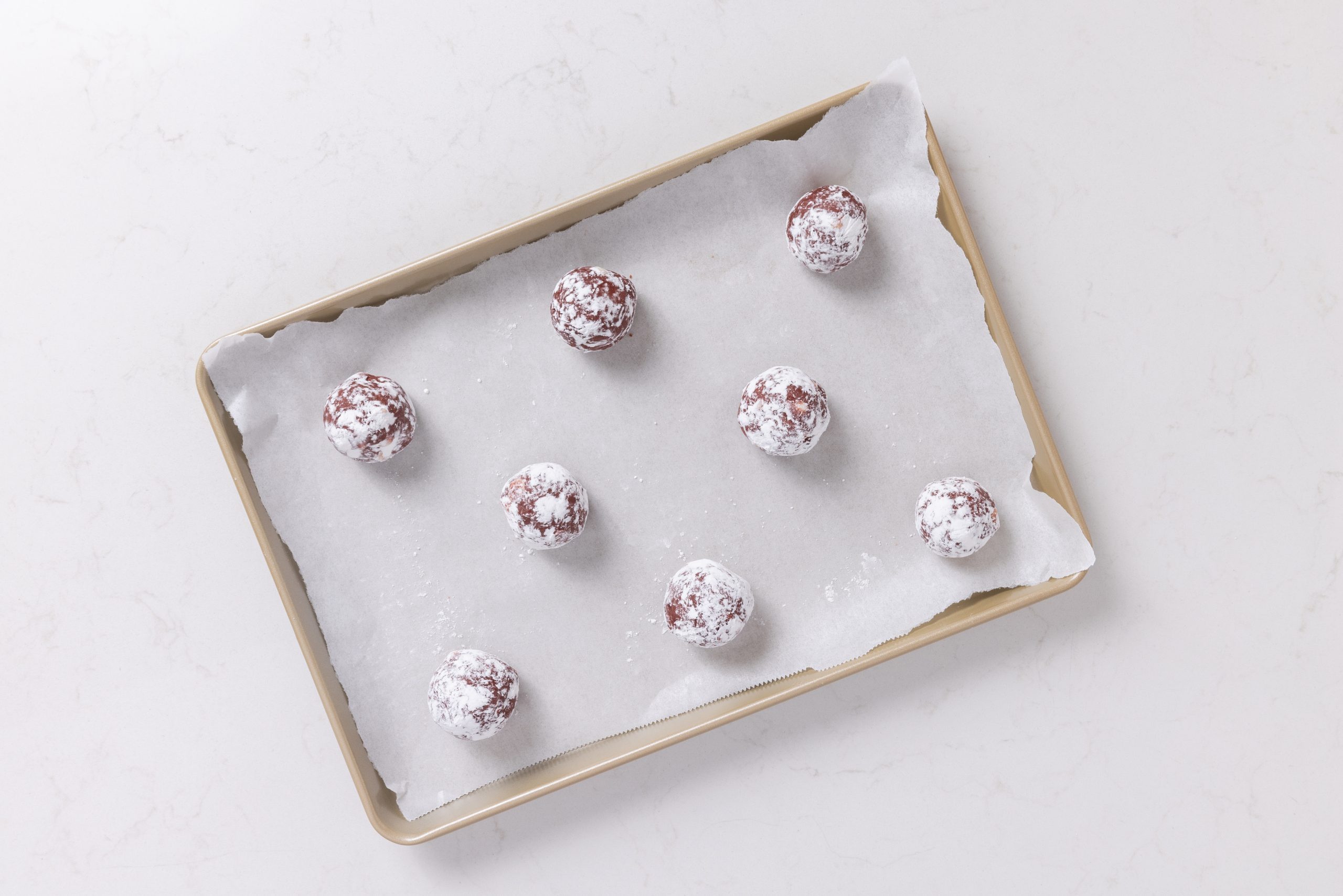 Cookies in baking sheet ready to be baked.