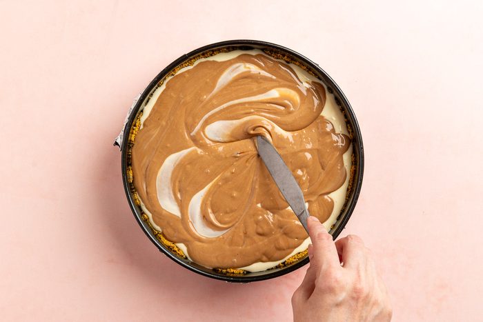 Taste of Home Reese's Cheesecake recipe photo of the fudge swirl.