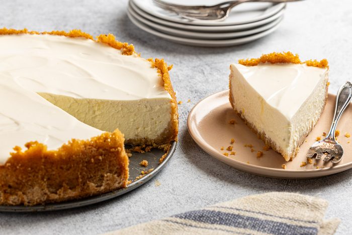 Taste of Home Ricotta Cheesecake recipe photo a slice of the cheesecake on a plate.