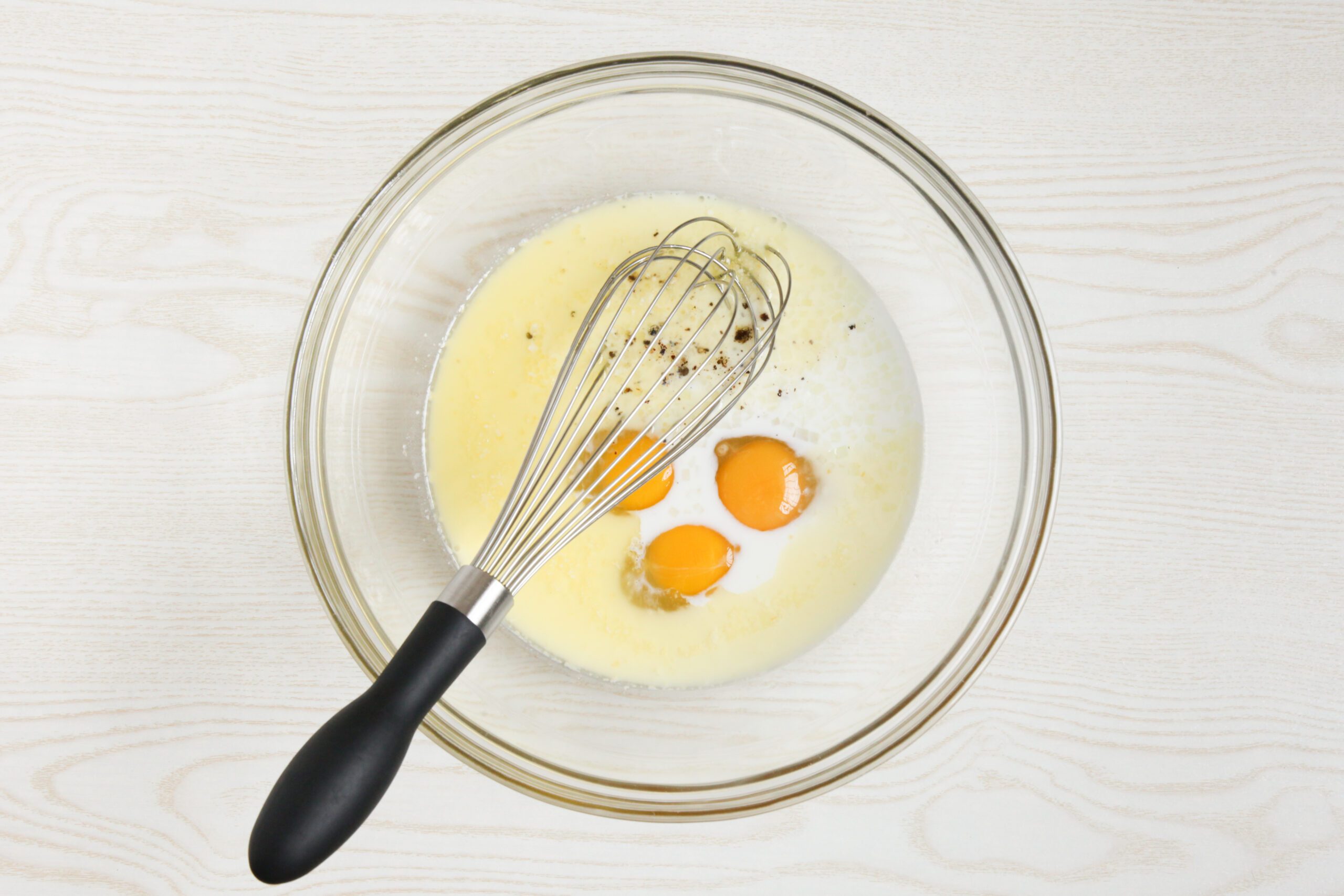 Making the egg mixture for scalloped corn