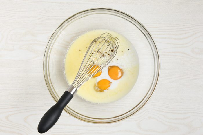 Making the egg mixture for scalloped corn