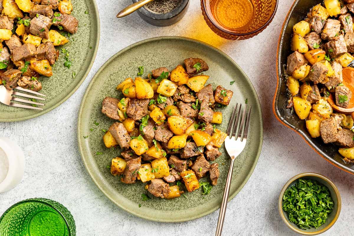 Taste of Home Steak and Potatoes recipe photo of the finished recipe served on plates.