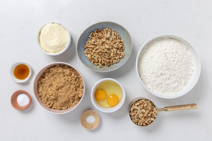 Ingredients for walnut cookies on kitchen counter.