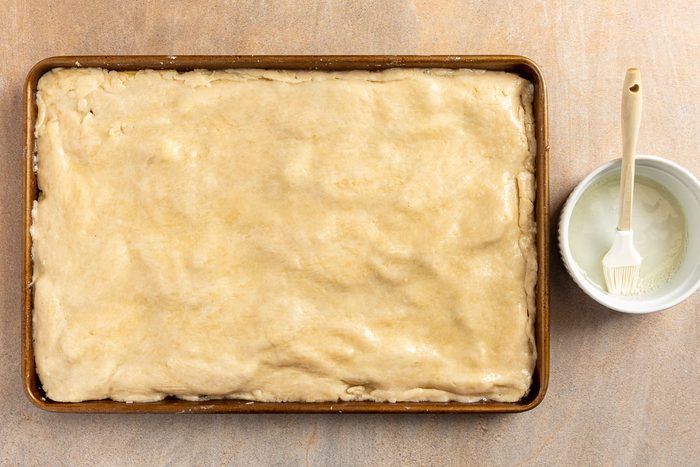 Taste of Home Apple Danish recipe photo of adding the second layer of pastry.