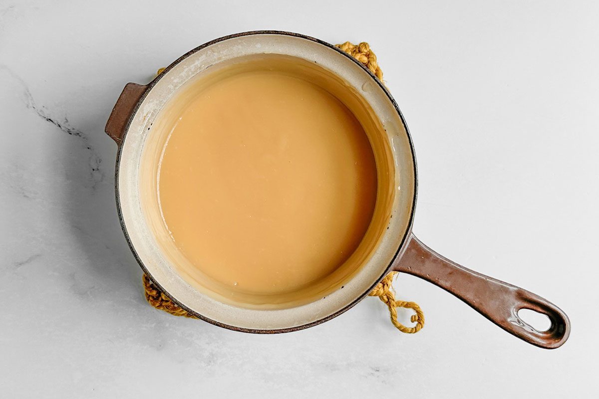 Filling ingredients for Taste of Home Butterscotch Cake in a ceramic saucepan