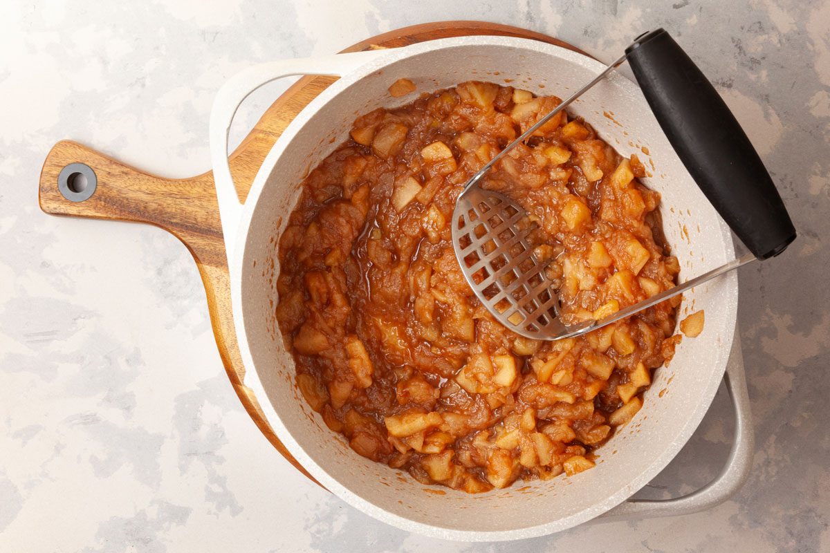 Step 2 of Taste of Home Chunky Applesauce is to partially mash the apples and apples and add the vanilla off heat