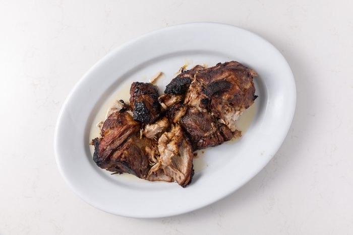 Pork roast removed from dutch oven to cool down.