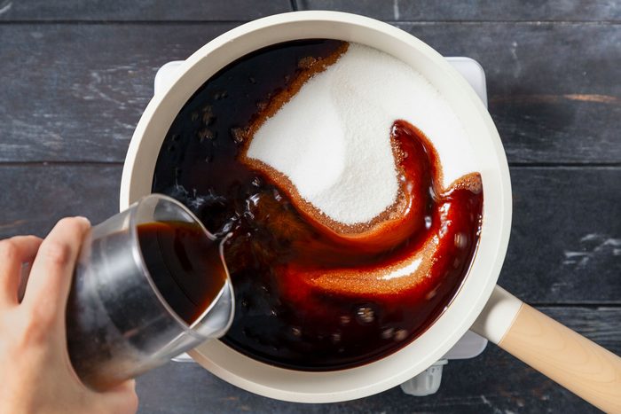Espresso and sugar in a large saucepan.