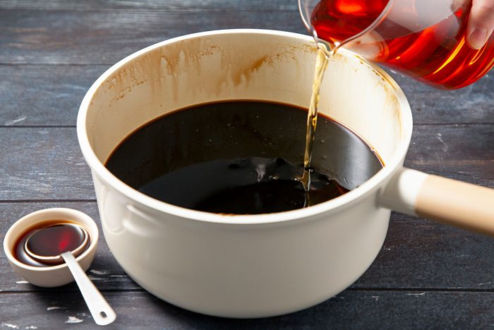 Rum being added to espresso mixture.