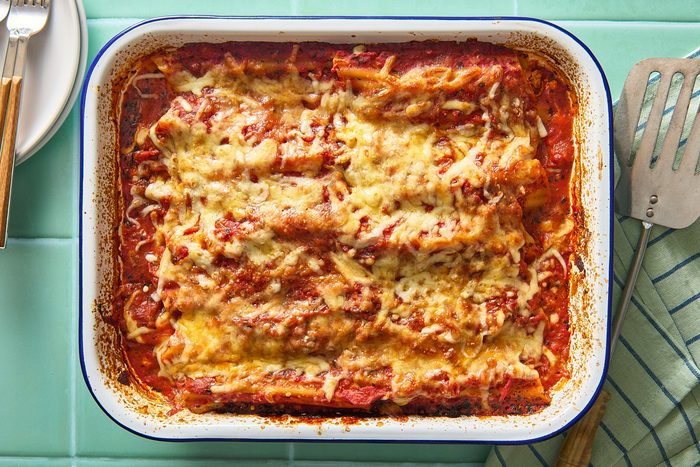 Overhead shot of a tray of baked cheese manicotti