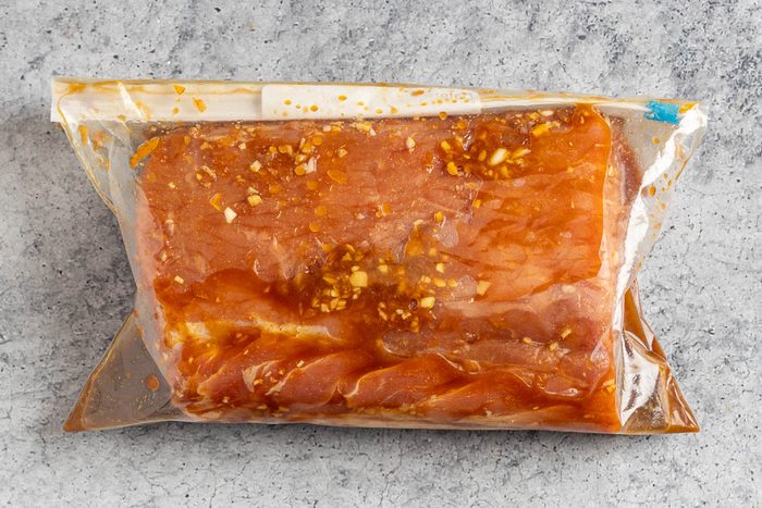 Taste of Home Marinated Pork Loin photo of the pork loin marinating in a resealable bag.