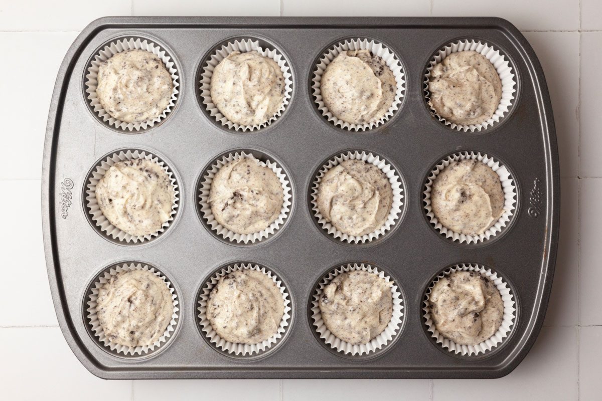Step 3 of Taste of Home Oreo Cupcakes is to fill the prepared cups 3/4 full, and bake the cupcakes for 20 to 22 minutes, or until a toothpick inserted in the center of one comes out clean. Let the cupcakes cool in the pans for 10 minutes before removing them to the wire racks to cool completely.