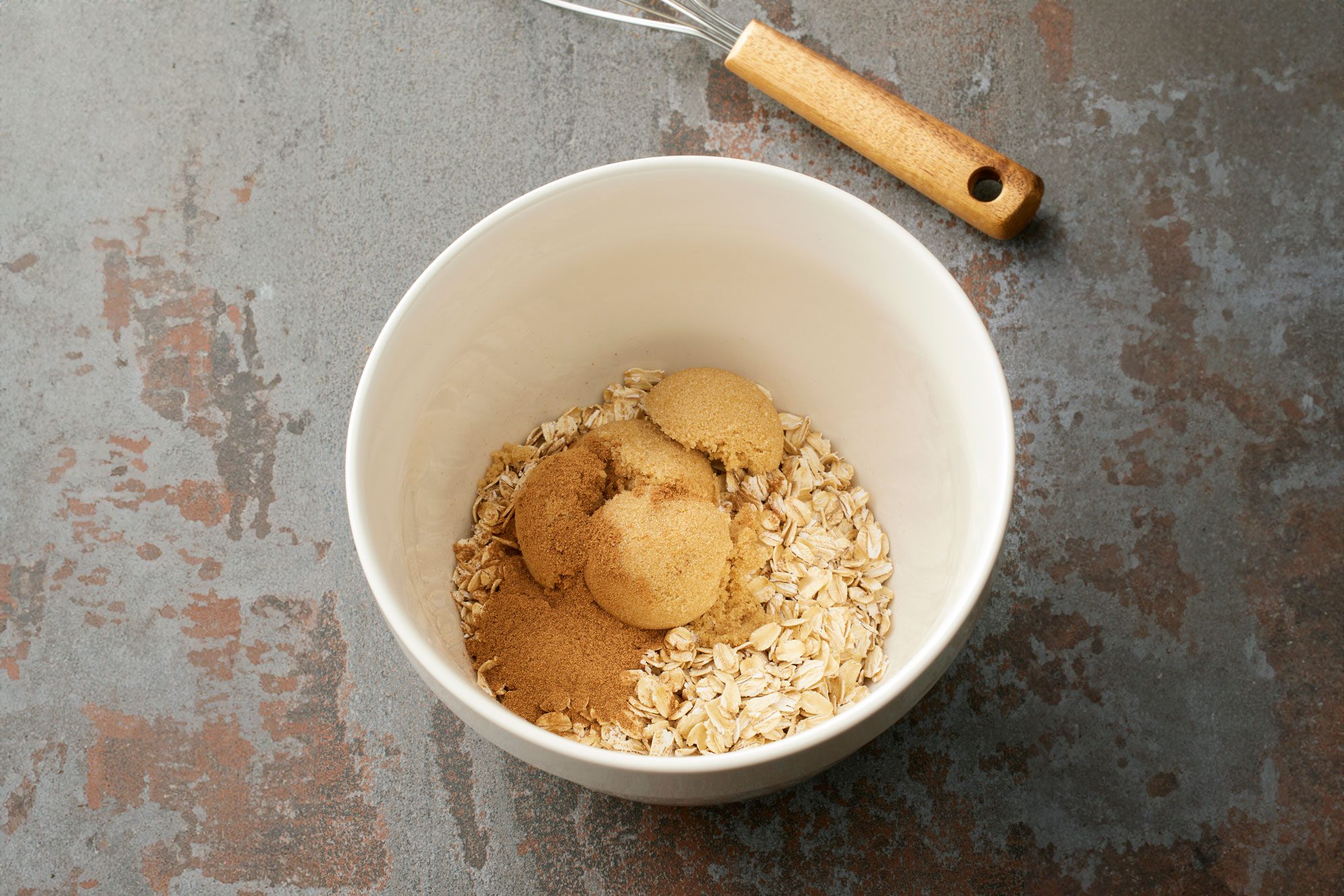 In a small bowl whisk together oats, brown sugar and pumpkin pie spice