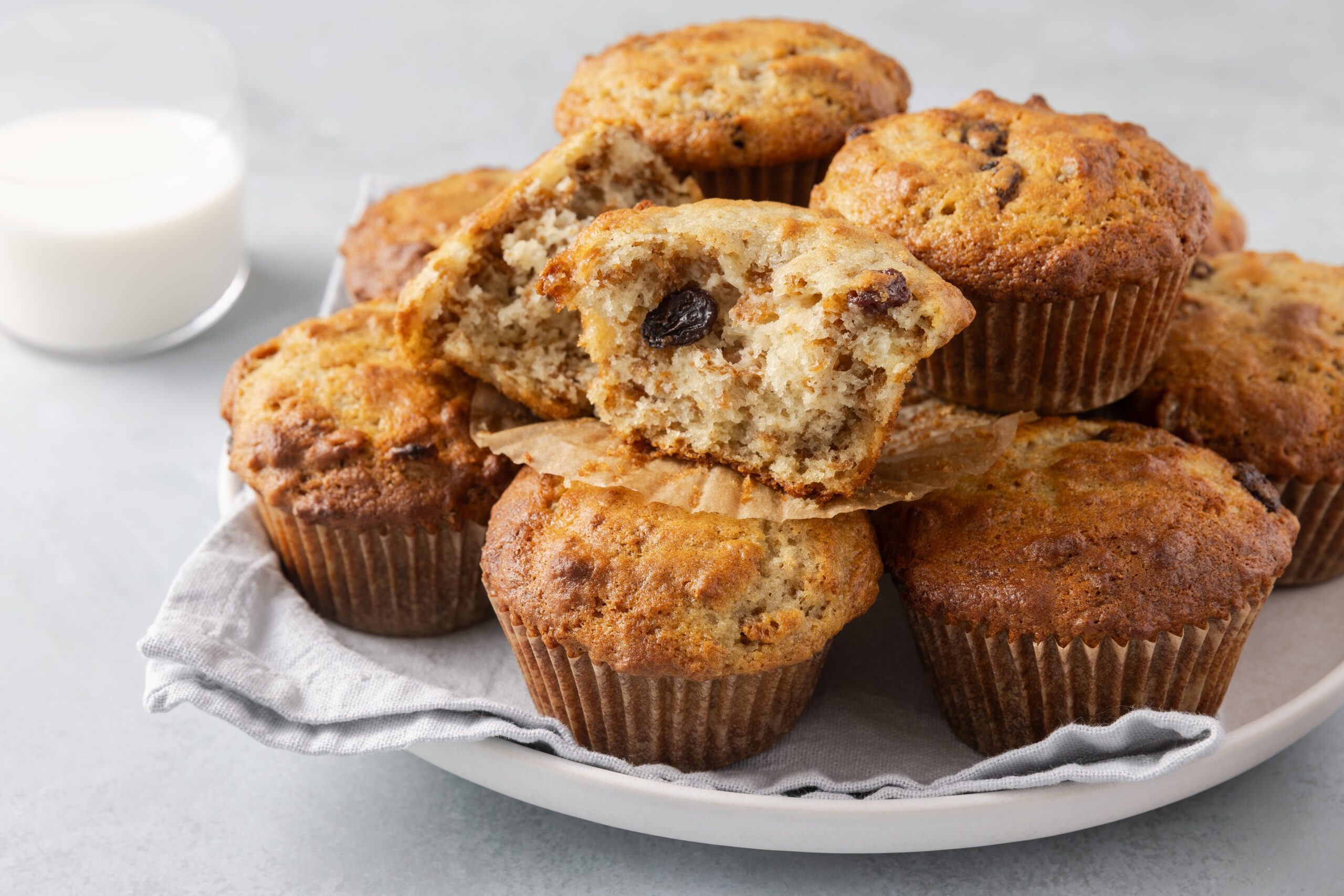 Muffins ready served on plate with inside showing.