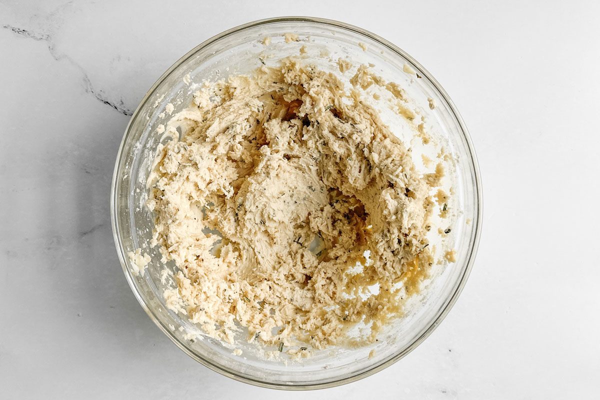 Dough for Taste of Home Rosemary Shortbread Cookies in a glass bowl