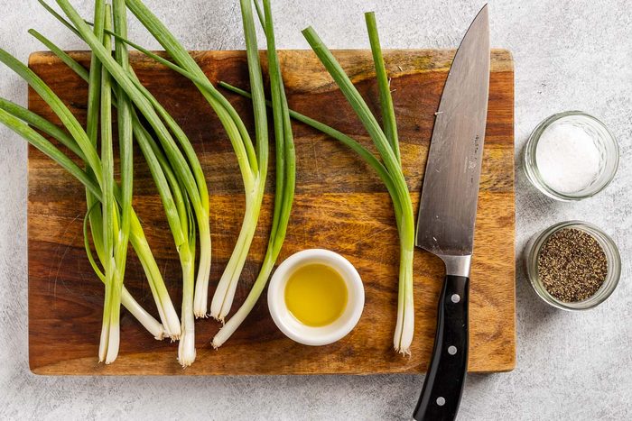 Taste of Home Skirt Steak Tacos recipe photo preparing the onions for the grill.