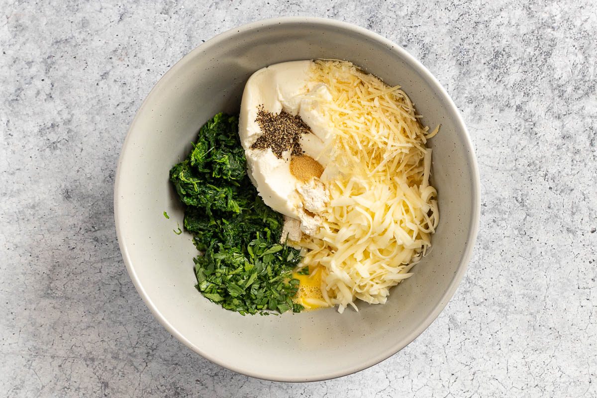 Taste of Home Spinach Manicotti recipe photo of making the filling.