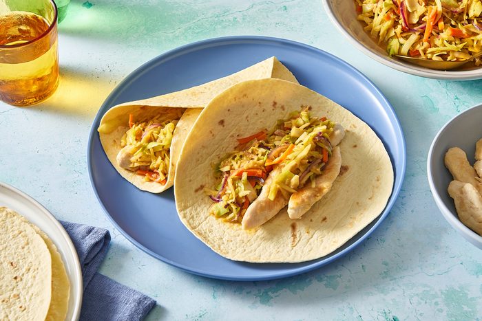 Shot of two Thai chicken wraps served on a plate