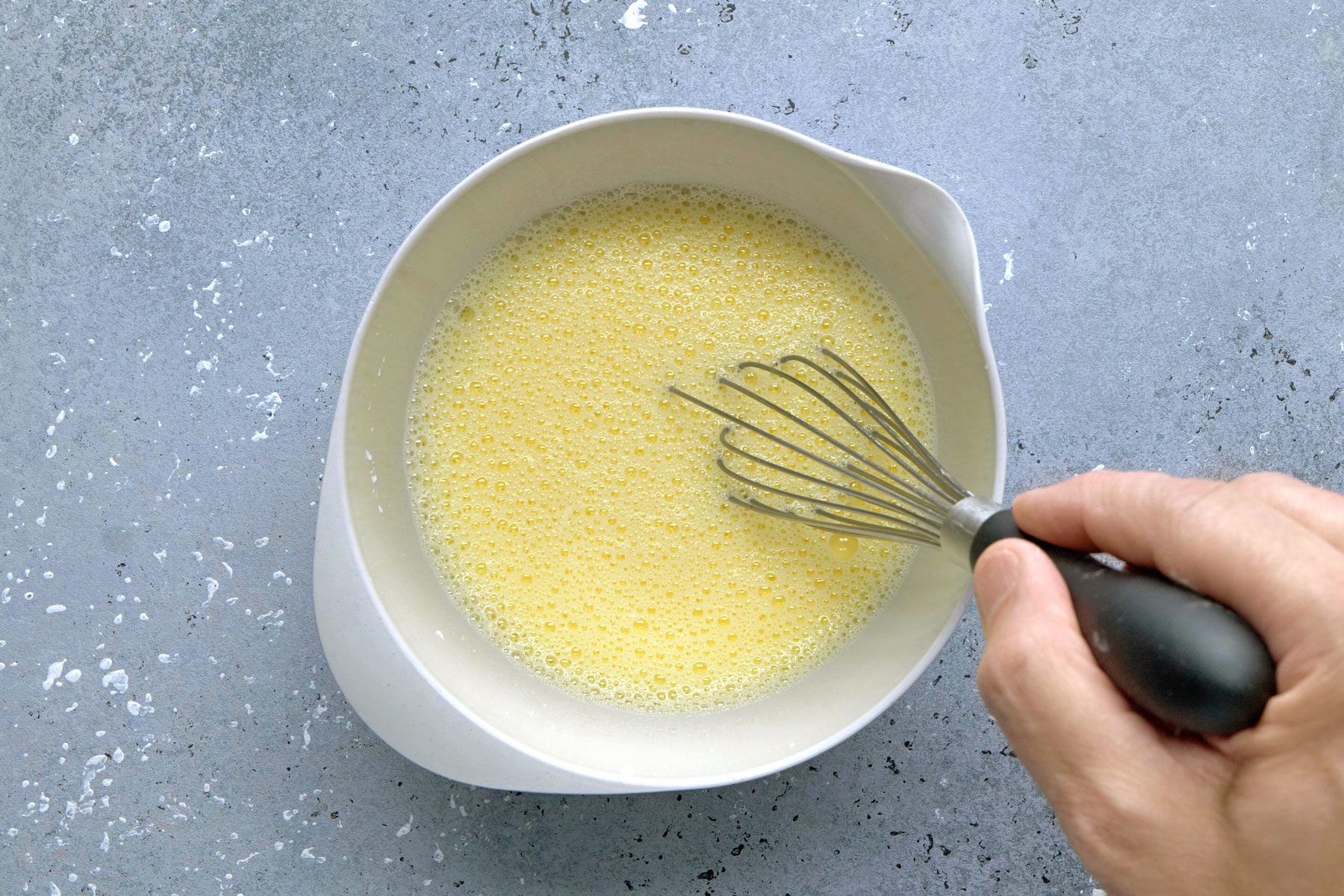 Cornstarch whisked with milk.