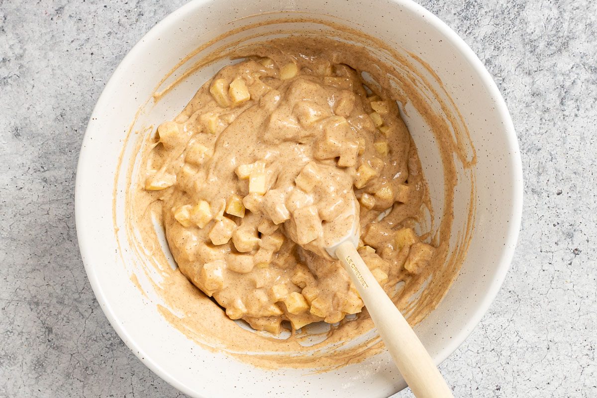 Taste of Home Air Fryer Apple Fritters photo of folding in the apples. 