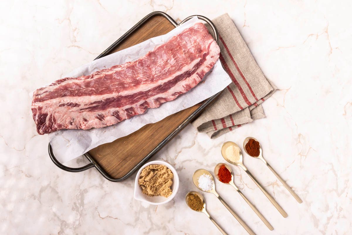 ingredients for Air Fryer Pork Ribs shot overhead on marble table