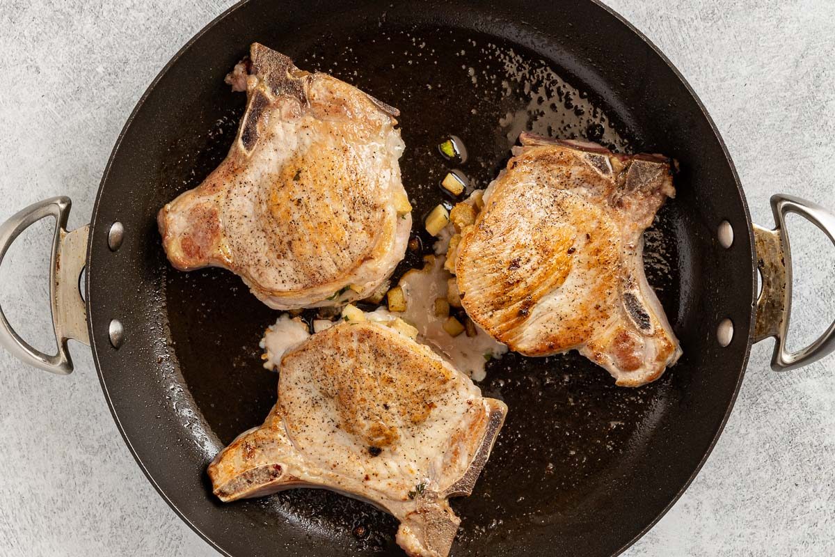 cooking pork chops in skillet