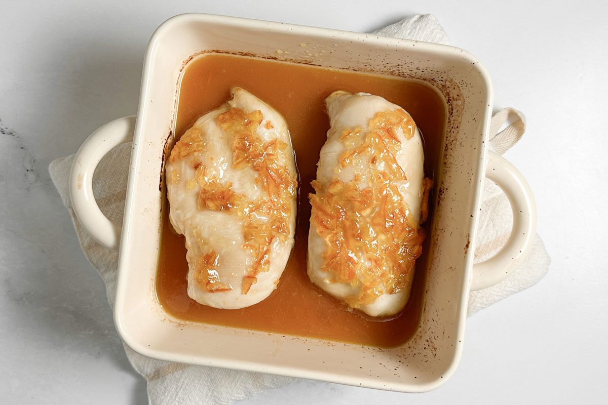 Taste of Home Baked Orange Chicken in a ceramic baking dish