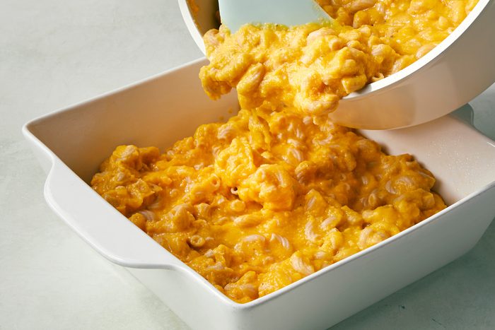 Transfer to a greased 8 inch square baking dish; Sprinkle with bread crumbs