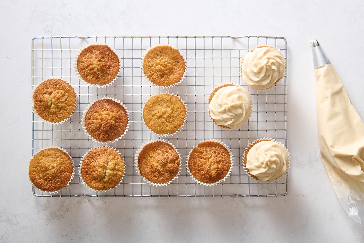 Frosting the baked cupcakes
