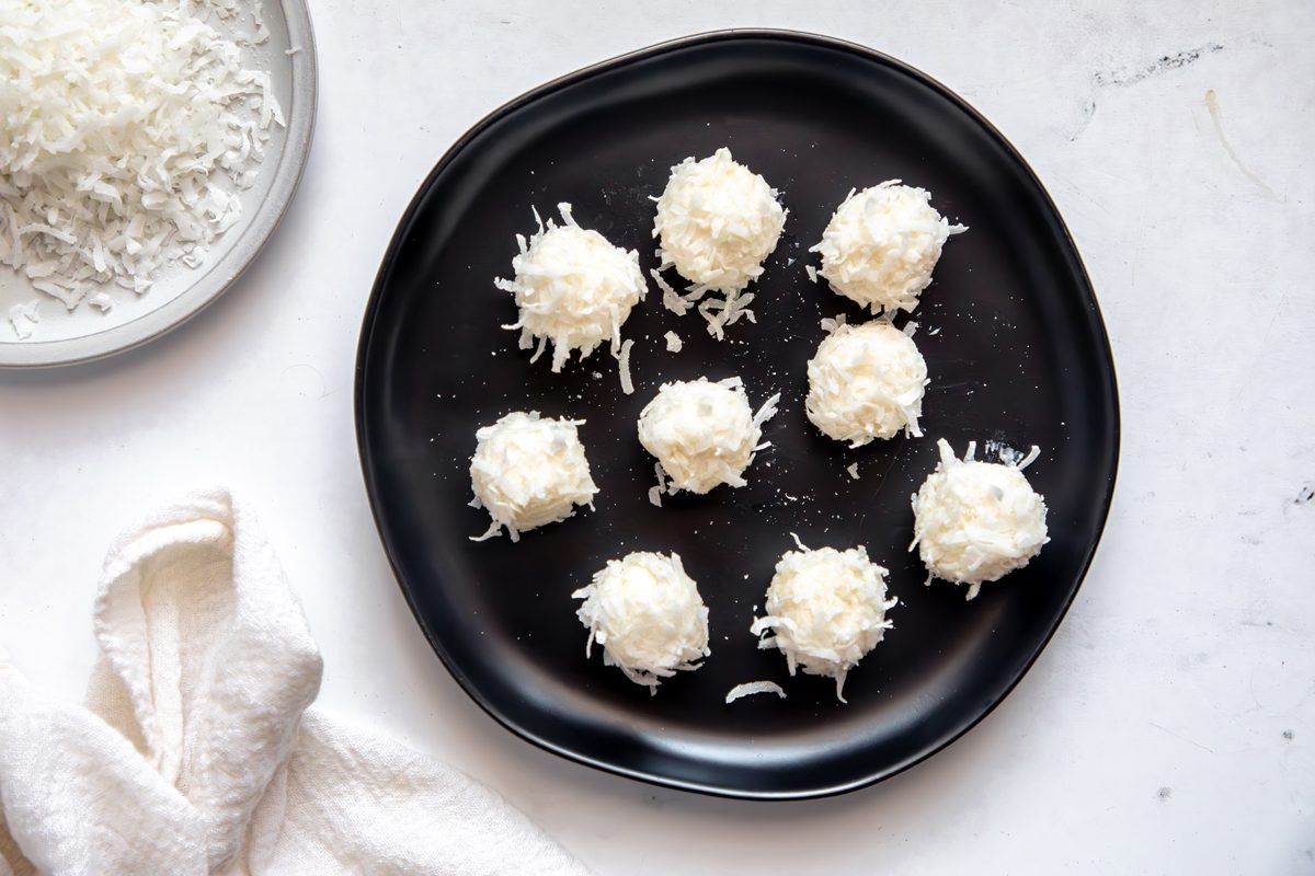 Close up beauty shot for Taste of Home Coconut Snowballs, with additionall shredded coconut in the corner.