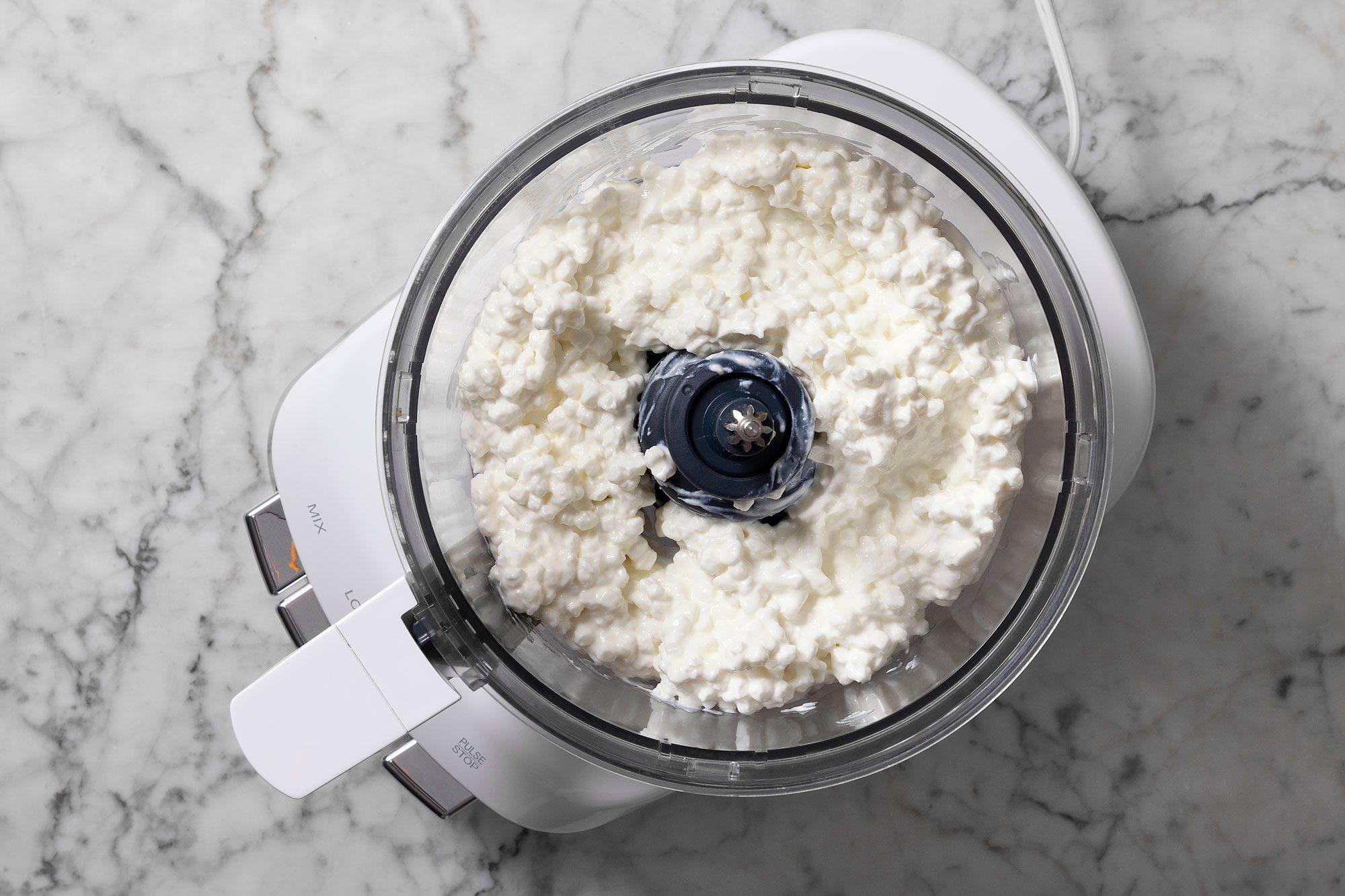Add cottage cheese to the clean bowl of food processor