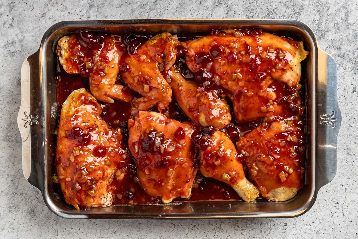 Taste of Home Cranberry Chicken Recipe photo of the sauce poured over the chicken.