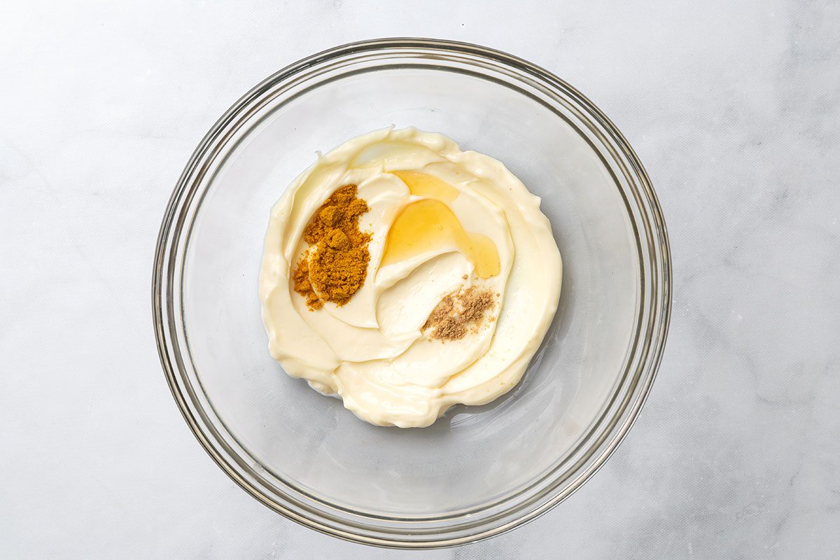 Mayonnaise, curry powder, honey and ground ginger in a mixing bowl or step one of Curried Egg Salad recipe for Taste of Home