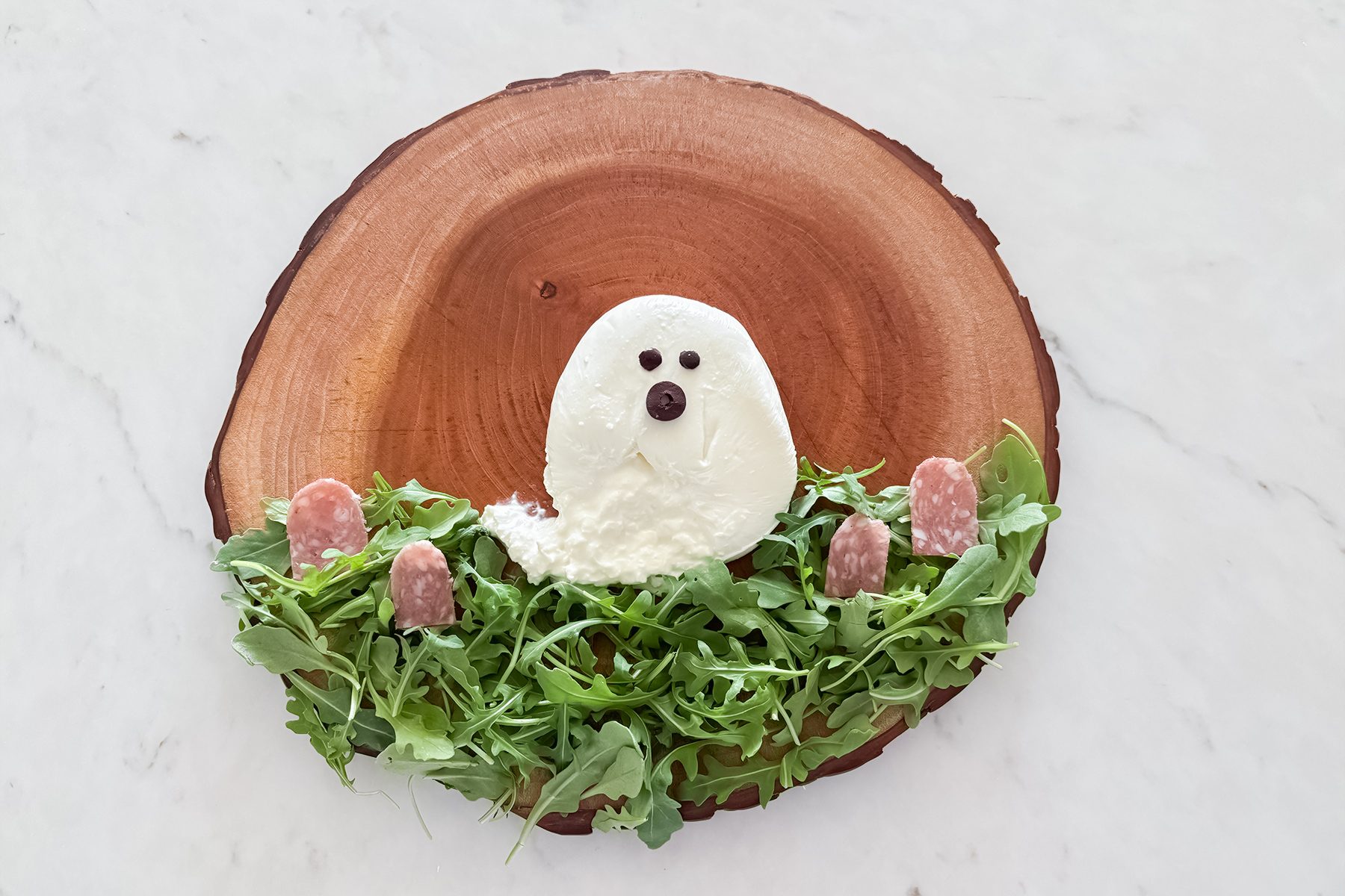 A plate with a white object on it.