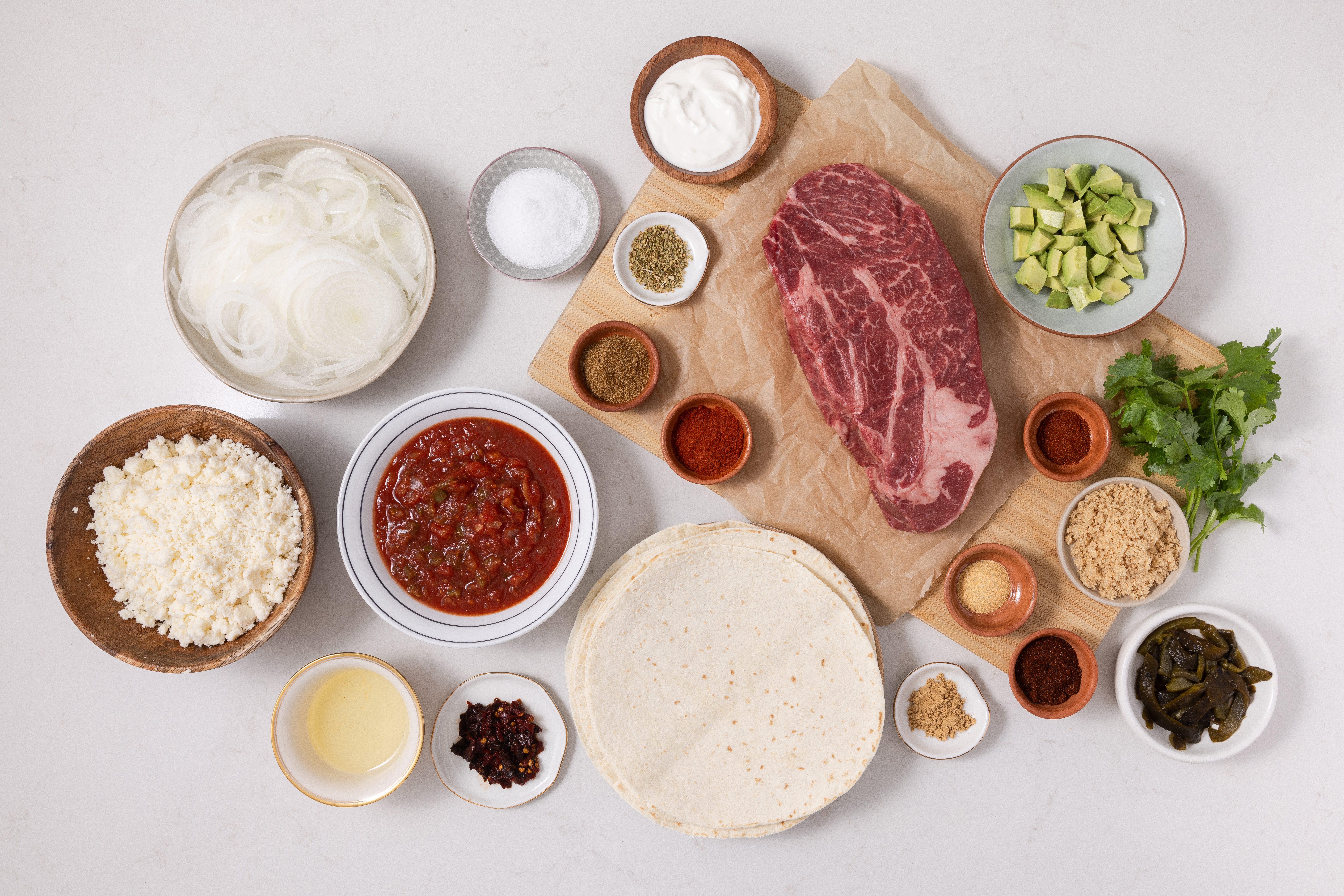 Ingredients for instant pot beef carnitas on kitchen counter.