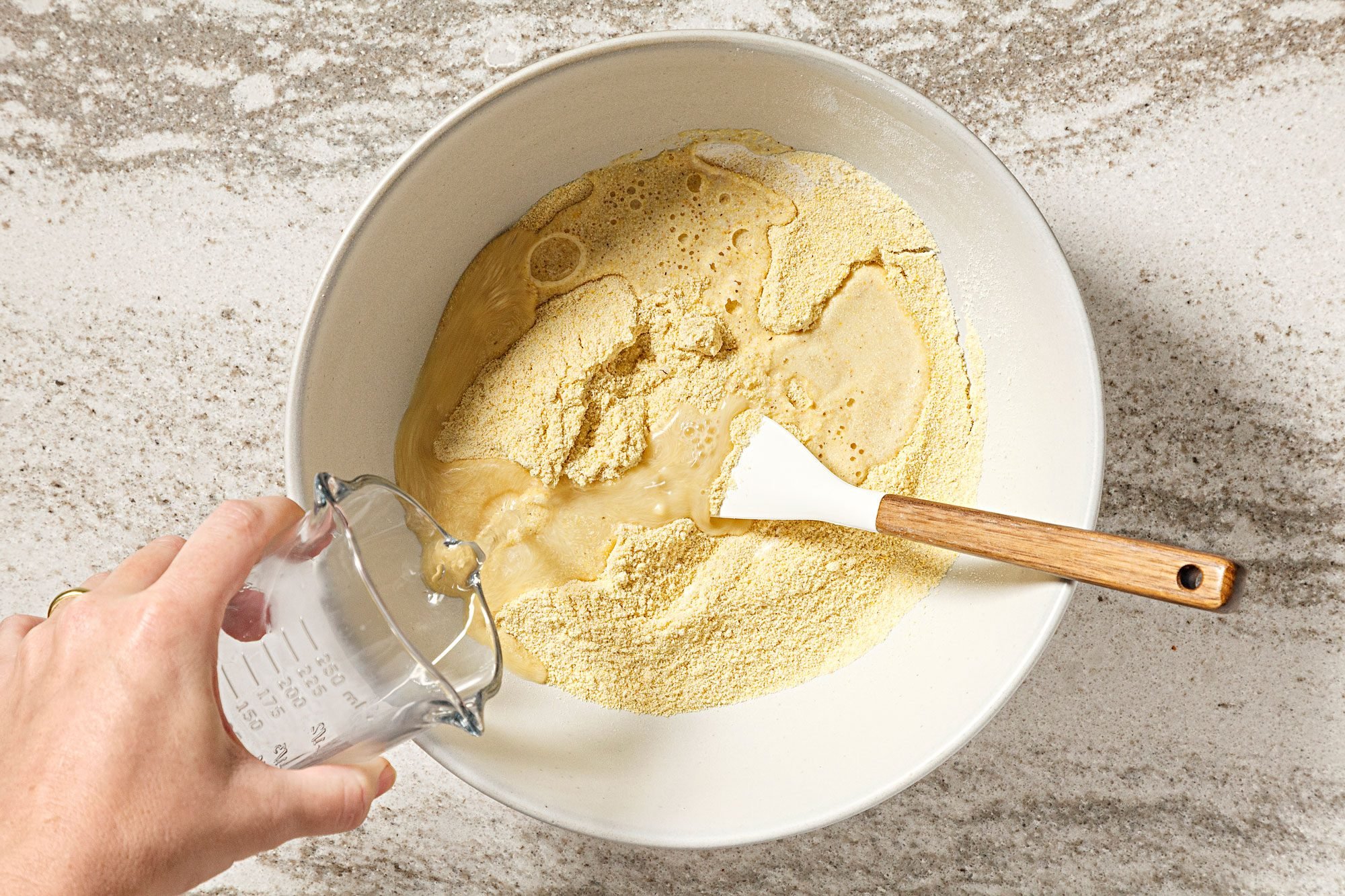 Stir in 3/4 cup warm water.