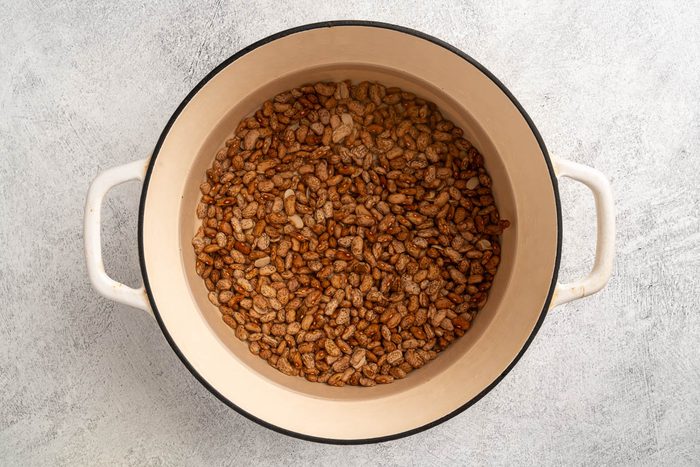 the dried pinto beans covered in cold water.