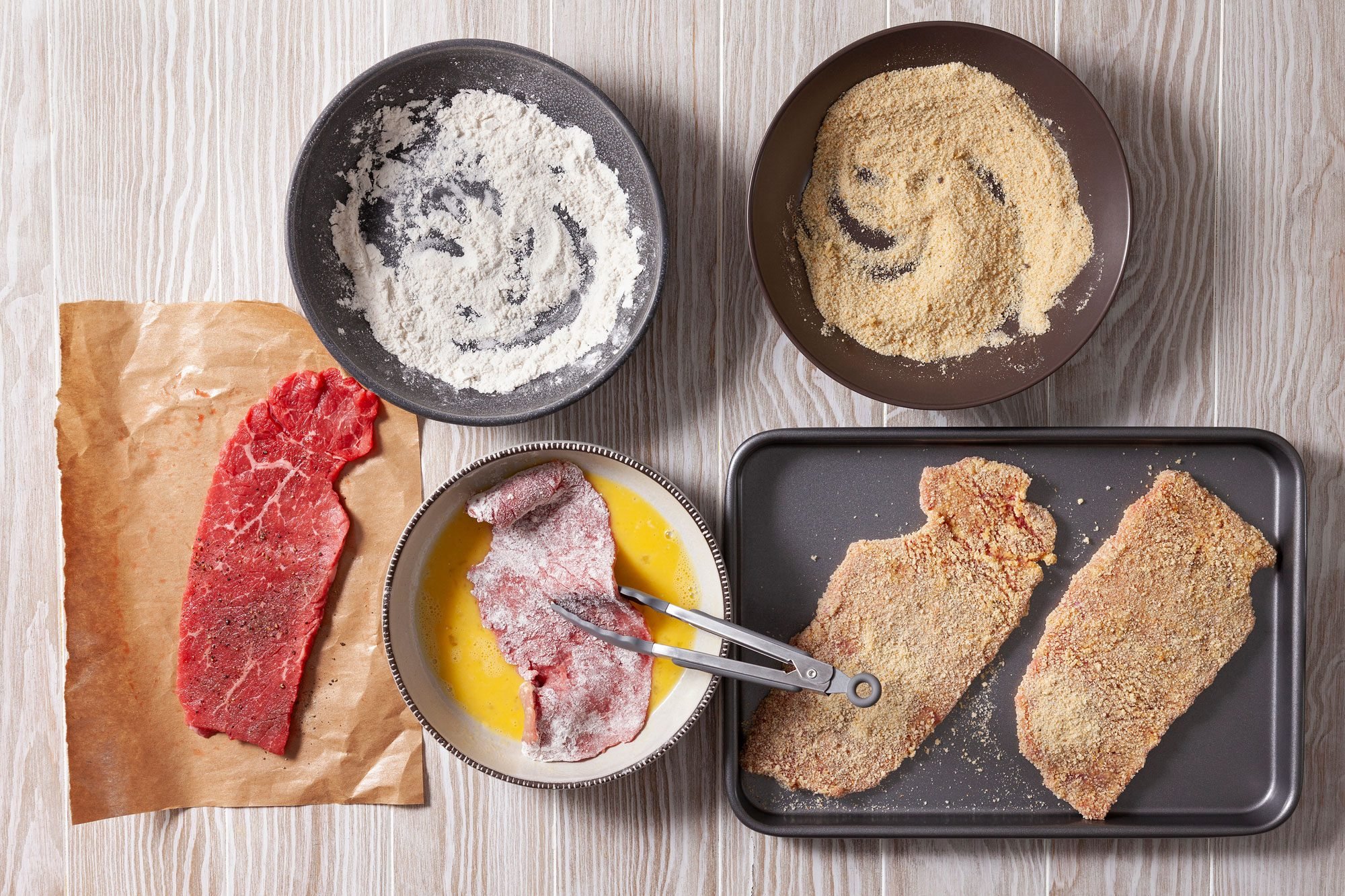 Combine the remaining seasoning mixture and breadcrumbs in a shallow bowl. Place flour and egg in separate shallow bowls.