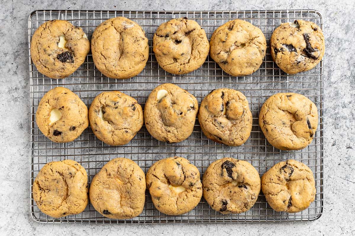 Taste of Home Oreo Cheesecake Cookies photo of the baked cookies on a cooling rack.